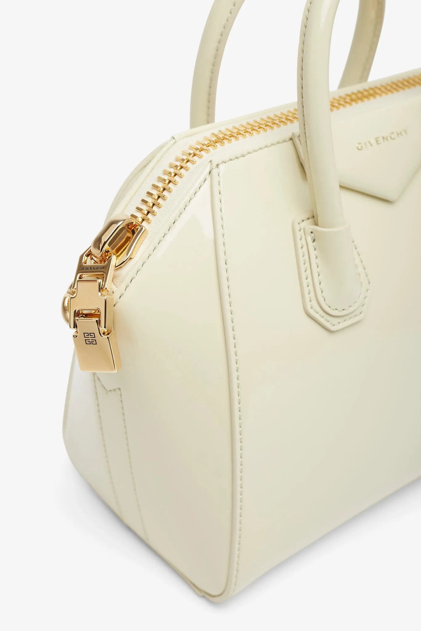 Antigona mini cream patent bag
