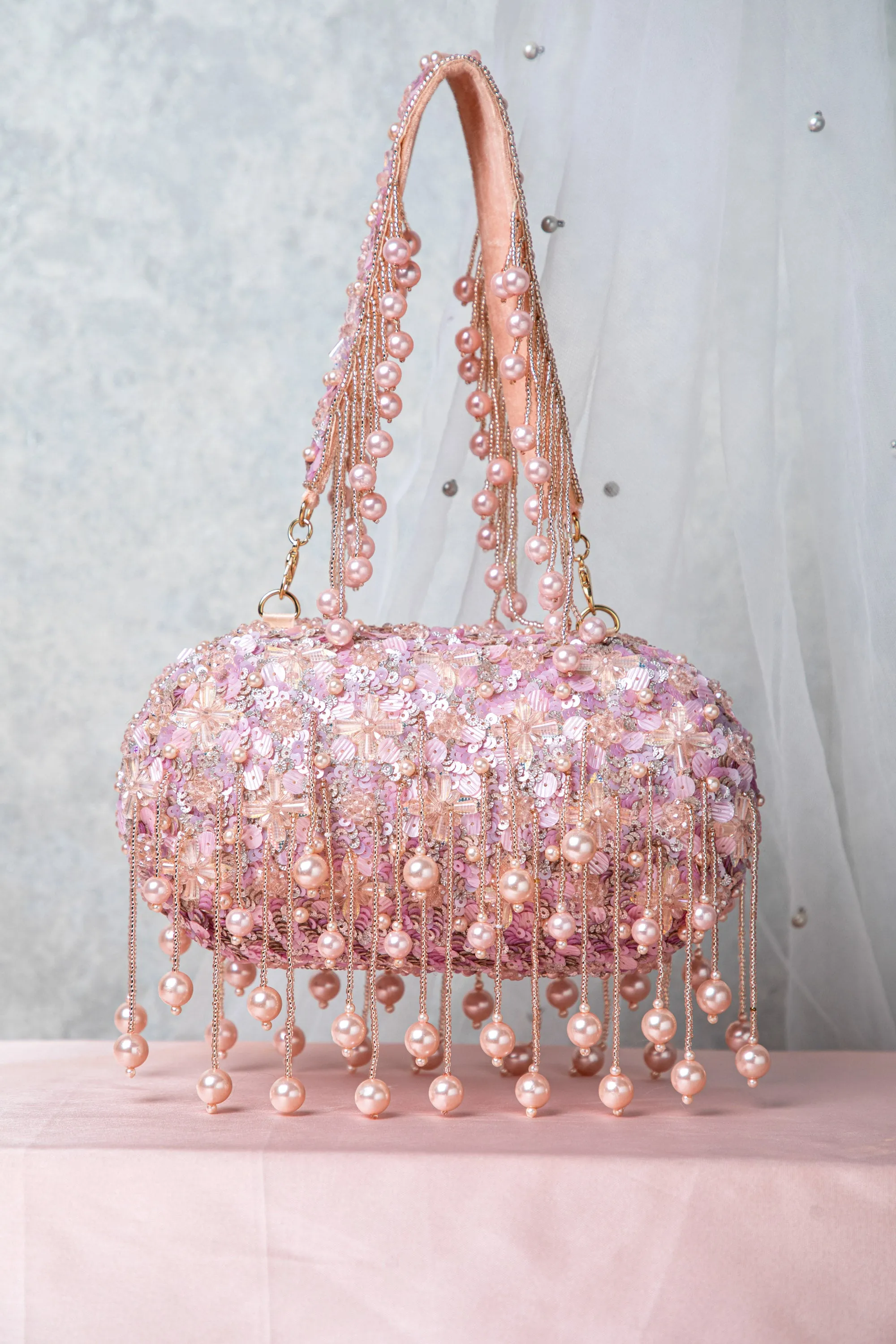 Aria Clutch – Rose Gold
