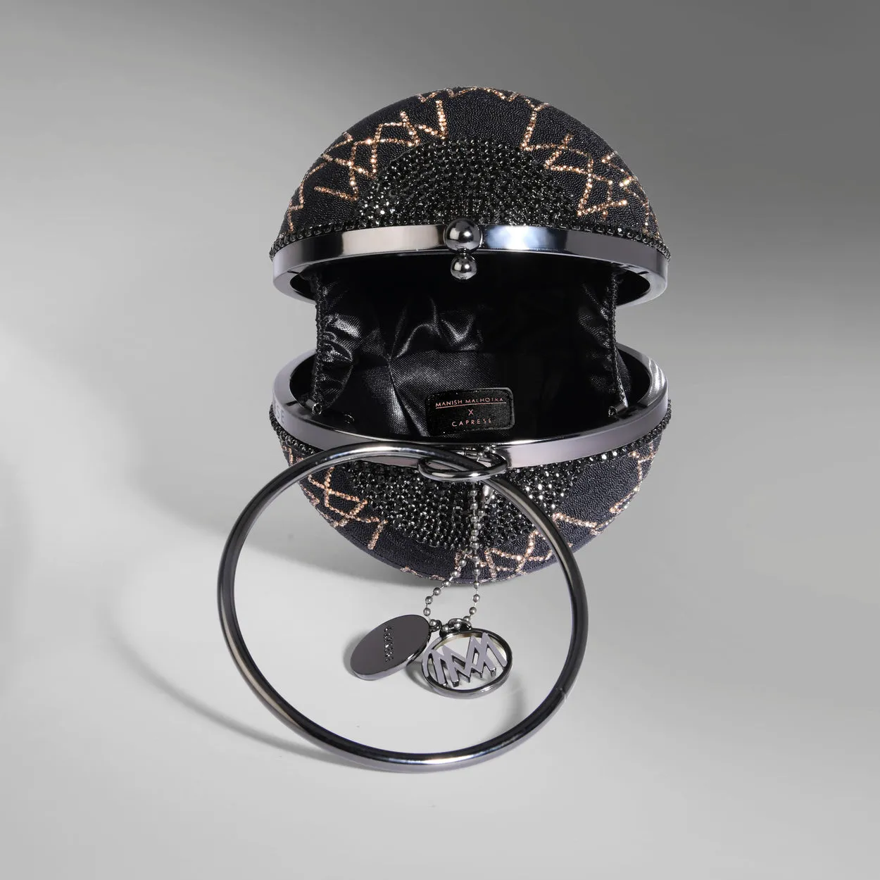 Caprese Enchant Black Gold Clutch