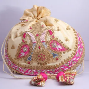 Cream colored embroidered Potli - Rent