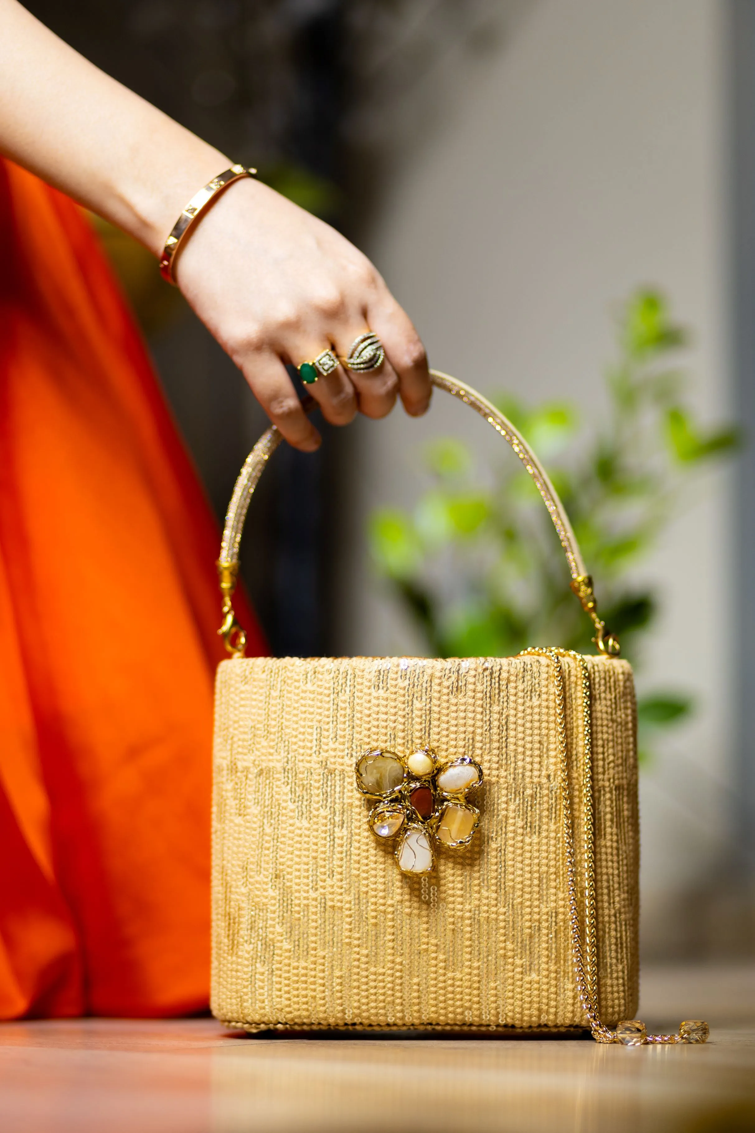 Crystal encrusted gold clutch
