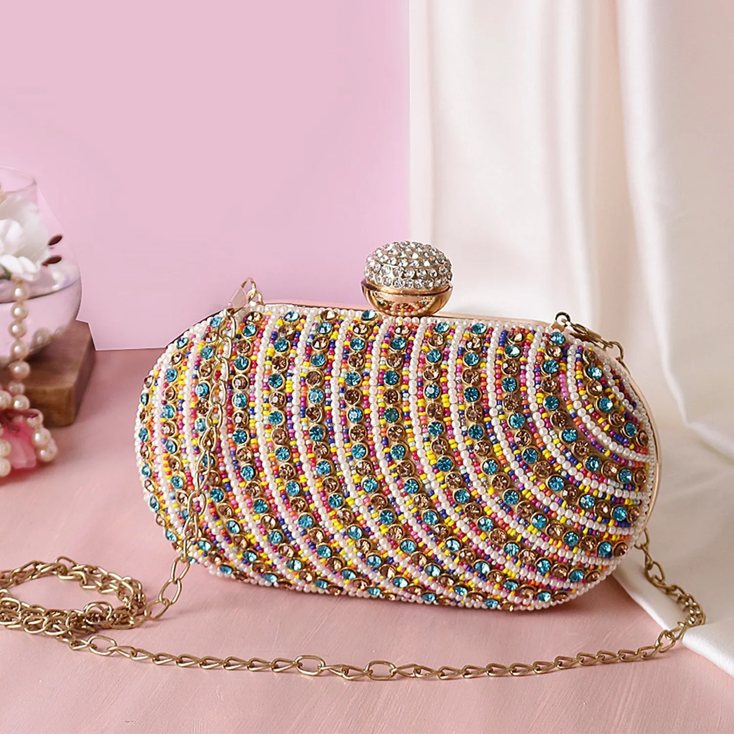 Designer assorted stone embellishment work oval clutch