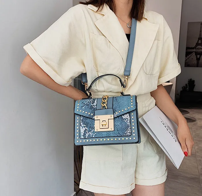 Elizabeth – Studded Snakeskin Crossbody with Chain Lock