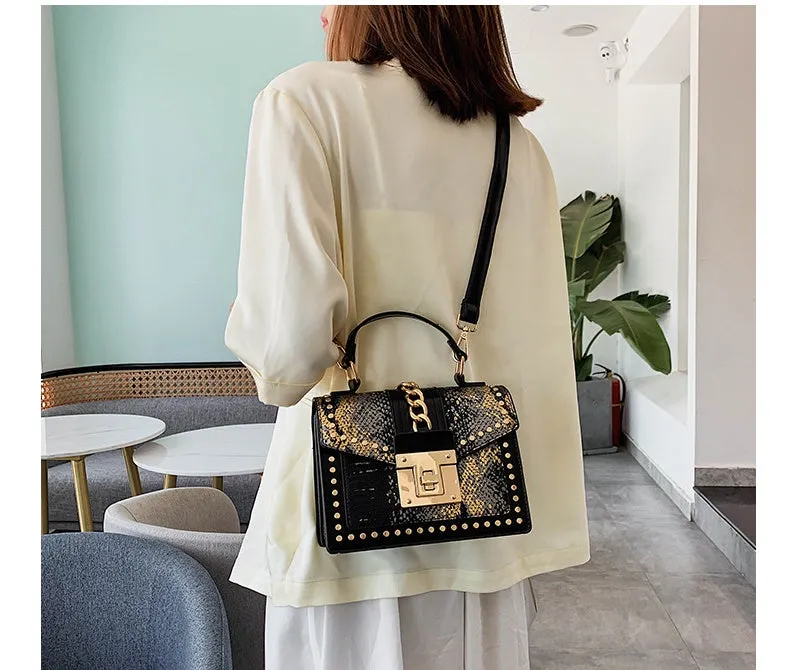 Elizabeth – Studded Snakeskin Crossbody with Chain Lock