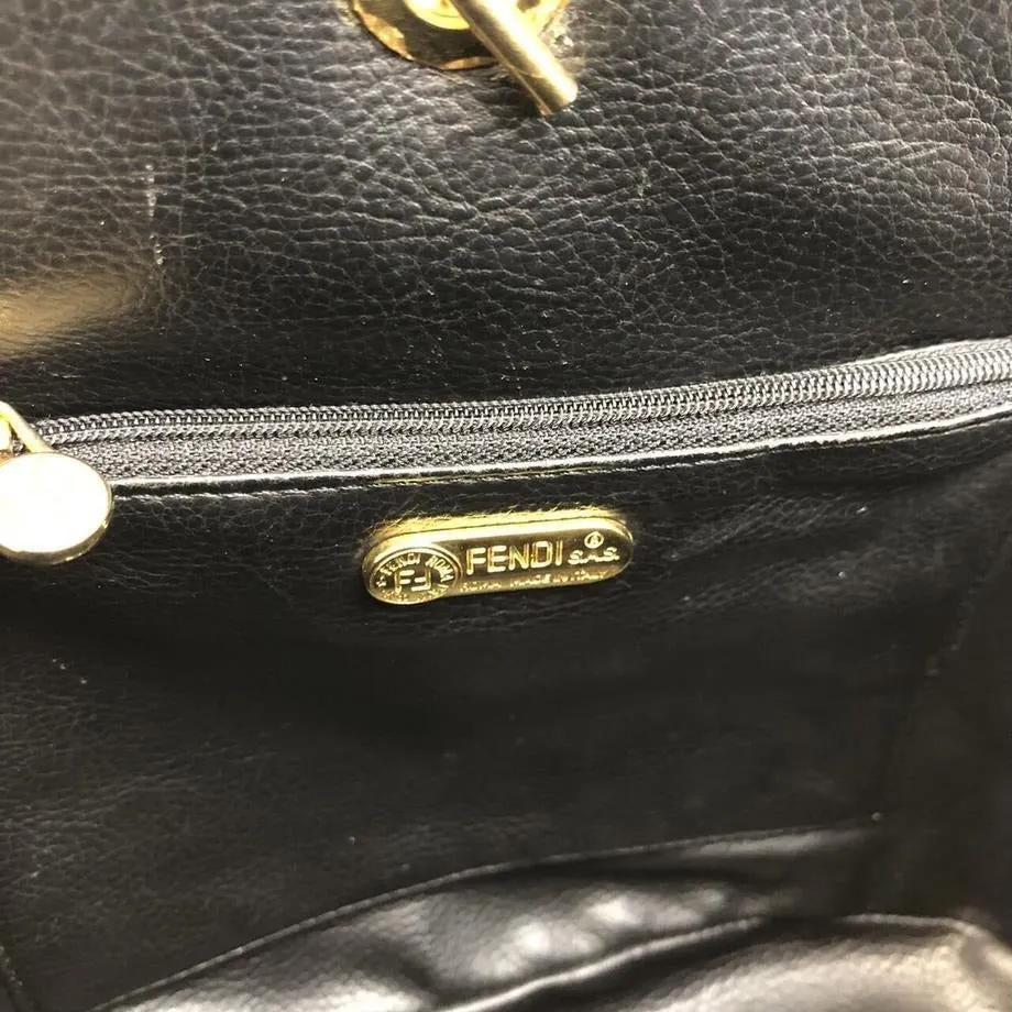 Fendi, black quilted suede with a 'pasta' or 'noodle' design, two way, sling style- clutch or cross body bag with gold 'pasta' accent beads