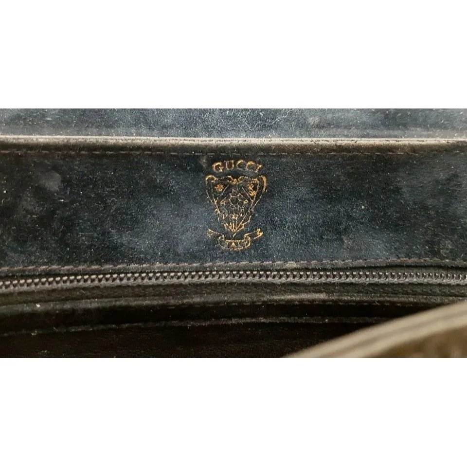 Gucci navy suede clutch w a round buckle accent