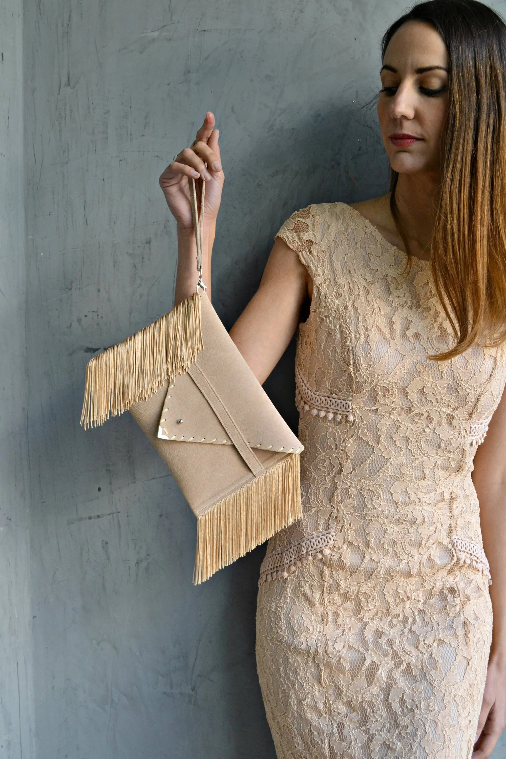 Medusa clutch in beige with silk fringes