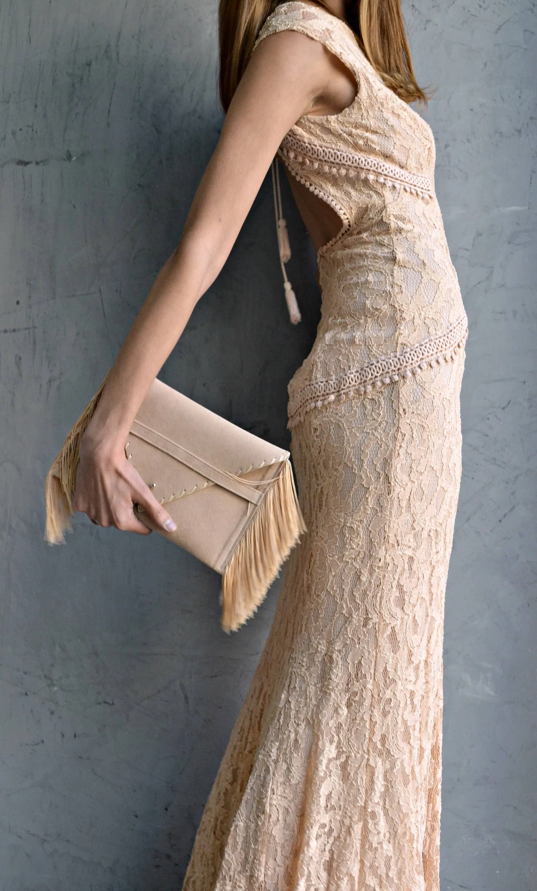 Medusa clutch in beige with silk fringes