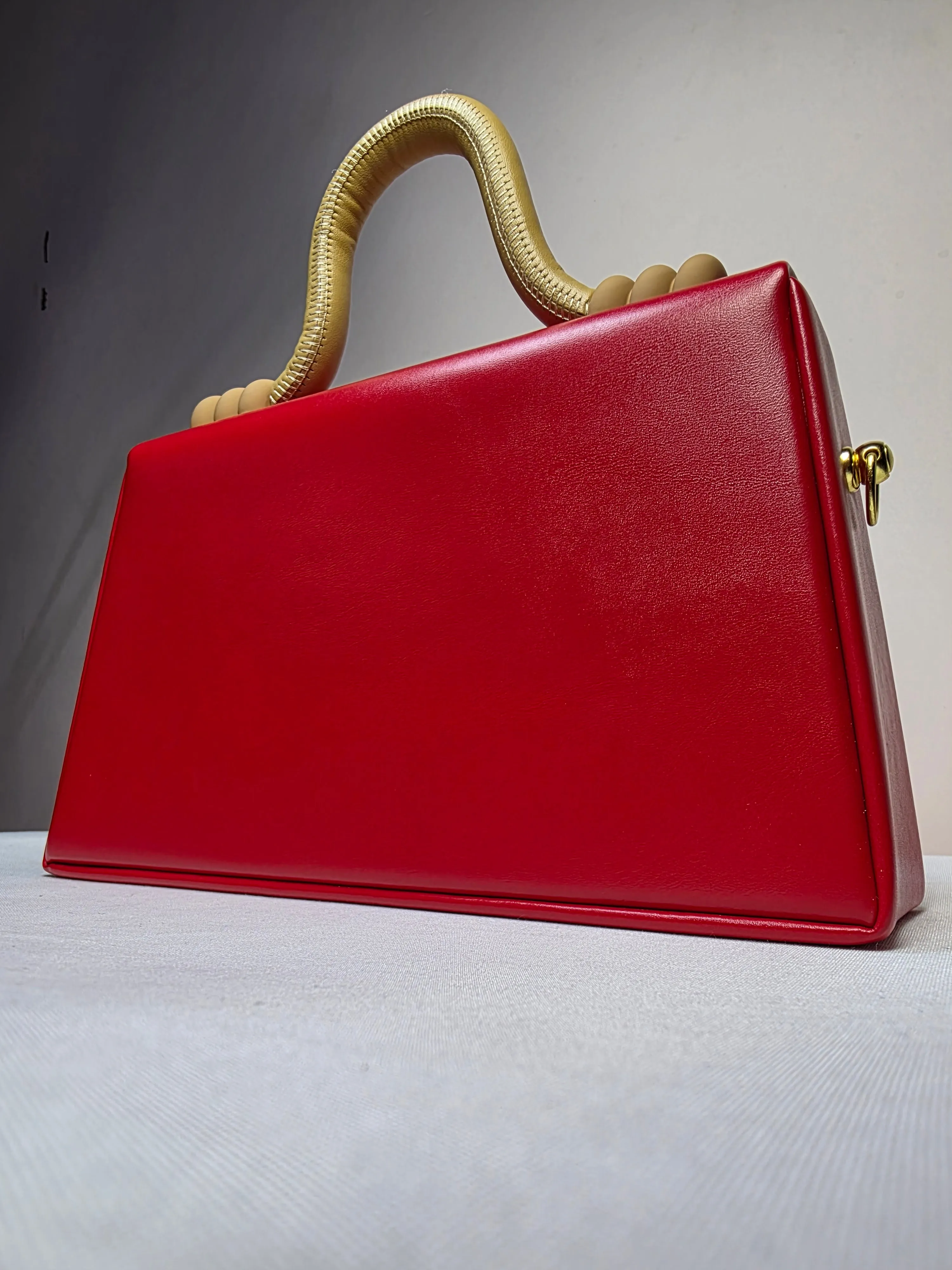 Statement Red Structured Handbag with Sculptural Handle