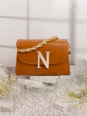 Tan N Alphabhet Intial Embellised Flap Bag