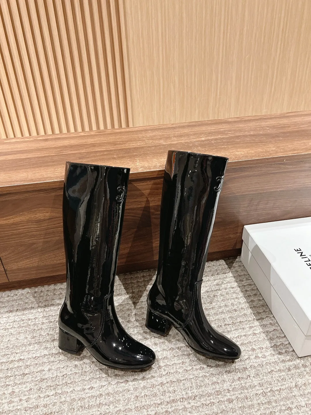 TRIOMPHE patent leather boots